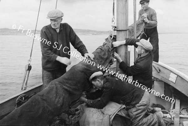 BOATS AND BOATMEN WITH LIFEBOAT TO INNISHMAAN CASHLA BAY  FR KILLEAN PP AND FR KEANE S.J.